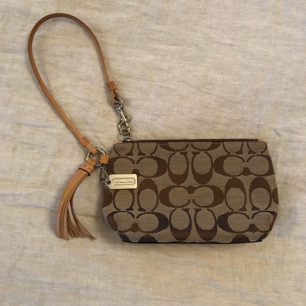 Tan Coach wristlet.